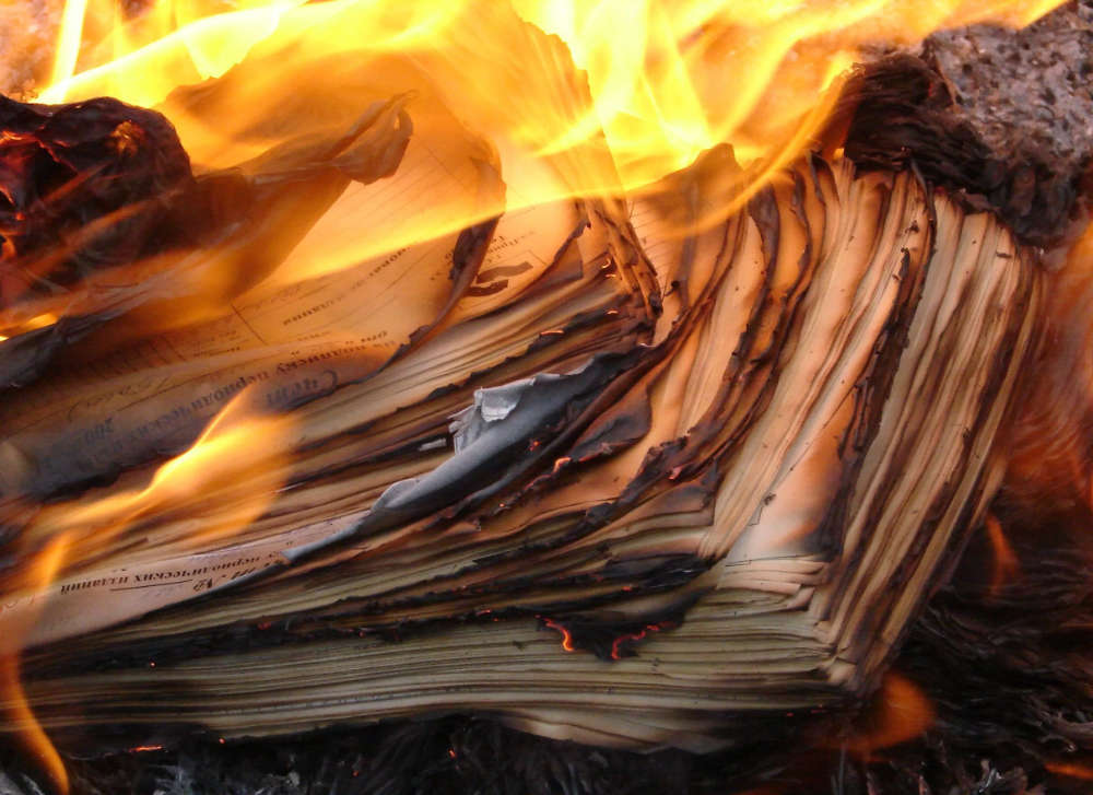 A stack of burning paper