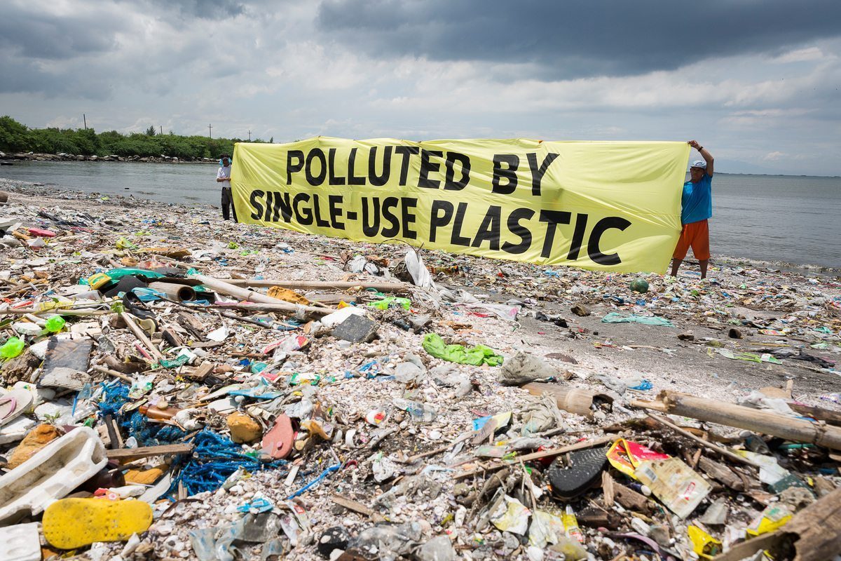 People protesting against single-use plastics