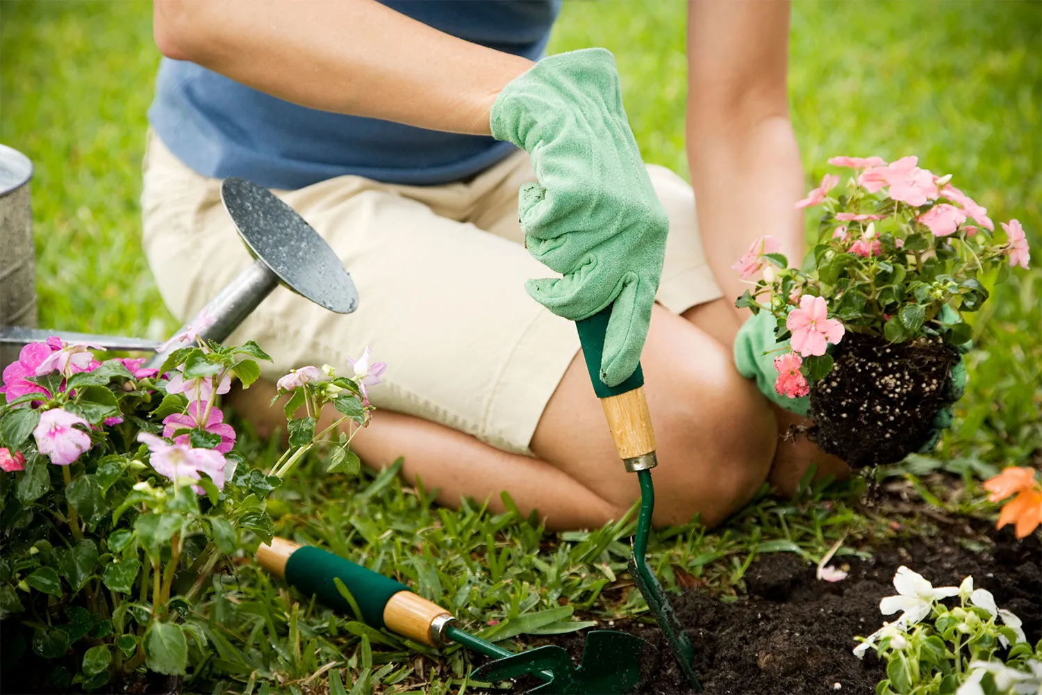A woman doing gardening in her backyard