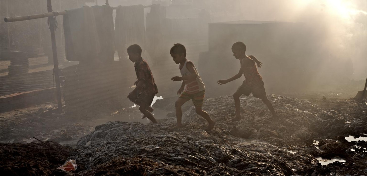 children playing in landfills