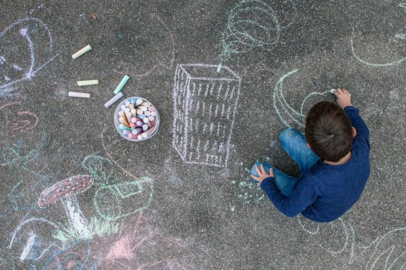 kids drawing with chalk
